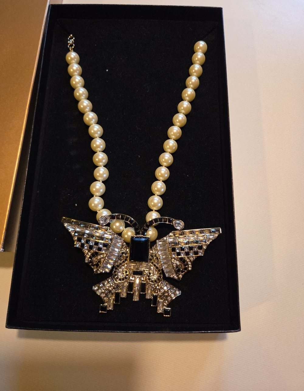 Heidi Daus Pearl Necklace with Black and Gold Crystal Butterfly Pendant